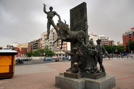 Madrid, Spain - June 13, 2022: Bullfighter sculpture in front of Bullfighting arena Plaza de Toros de Las Ventas in Madrid. Las Ventas Bullring in Madrid