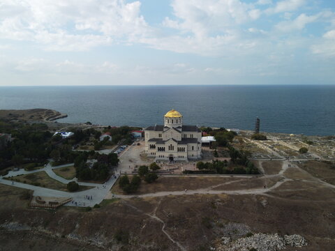 Chersones Sevastopol Crimea. Ruines of the ancient Greek city of Chersones. Archaeological excavations of an ancient structure. Aerial drone view Vladimir Cathedral and Chersonese Taurian, Crimea