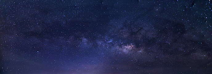 Fototapeta Panorama view universe space and milky way galaxy with stars on night sky background. obraz