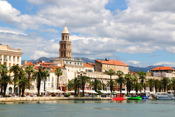 Fototapeta premium Promenade in Split, Croatia with landmark architecture and sailing boats.