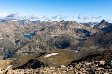 Panoramic view of mountain peaks with lakes
