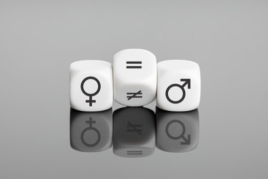 Gender equality concept. White block flipping a unequal sign to a equal sign between symbols of men and women