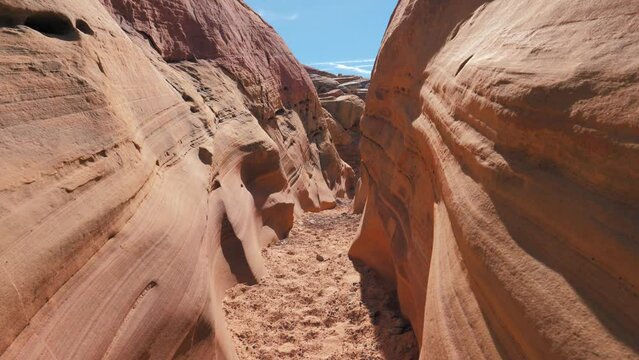 Aerial Flying Forward Canon Is Red Rock Monolith With Smooth Wavy Walls