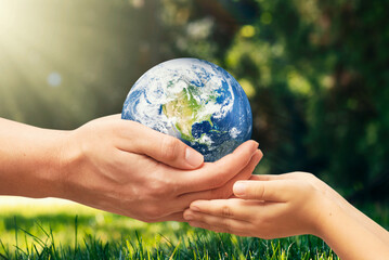 Earth globe in hands. World environment day. Elements furnished by NASA