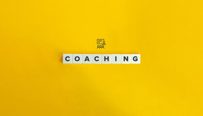 Coaching Banner. Word on Block Letter Tiles on Yellow Background. Minimal Aesthetics.