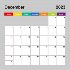 Calendar page for December 2023, wall planner with colorful design. Week starts on Sunday.
