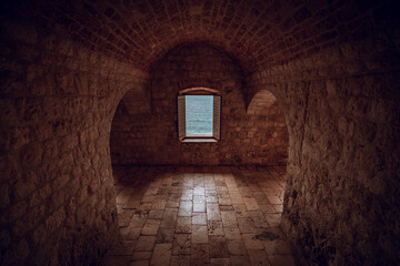 Looking out one of the windows in Fort Lovrijenac, Dubrovnik Croatia