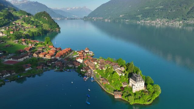 scenic peaceful Swiss lake, aerial view of Iseltwald on Brienz lake in Switzerland, beautiful Swiss nature, clear lake in Switzerland
