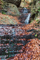 Waterfall in the Ukrainian Carpathians (Gorgany mountain range). Mountain watrefall colled Pid Komynom