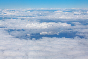 Clouds panorama view from the aircraft window . Flying in stratosphere . Weather forecast concept