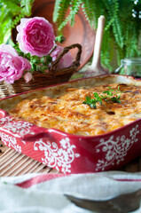 Potato gratin. Baked potato with cream, cheese and garlic. 