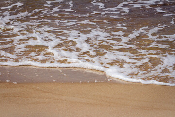 Sand beach and waves