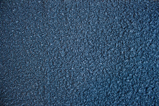 blue background with boucle fabric close-up
