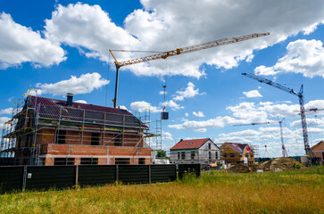 Fototapeta na wymiar Construction of a new houses. Construction of a new residential area.