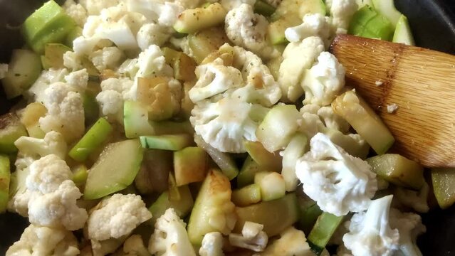 cooking vegetables in a pam with steam