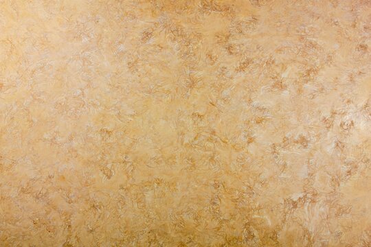 Plastic marble texture. Light beige-brown marble pattern.Marble stone pattern surface texture, beige abstract texture of old artificial granite.Marble imitation.