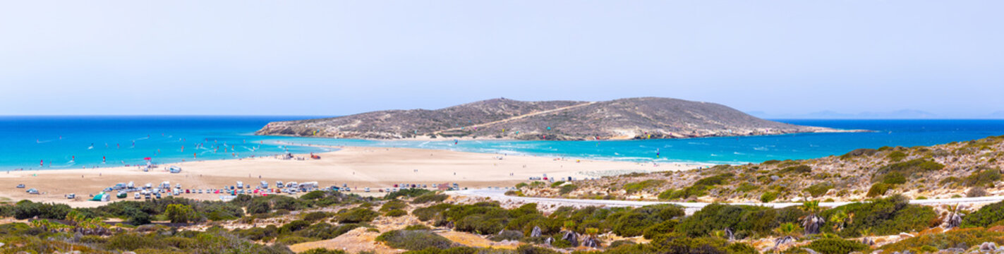 Prasonisi beach on the southern part of Rhodes, Greece. Famous surfer hotspot between two seas. People ride by  kitesurf and windsurf