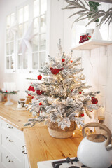 Christmas decoration on the kitchen. Kitchen interior holidays. New Year design.