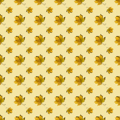 flat seamless pattern of maple leaves on a yellow background