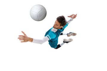 Portrait of young man, volleyball player in motion, training, playing isolated over white studio...