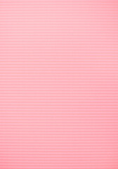 Abstract background made of corrugated paper for pink application. Space for text. Texture. Horizontal stripes.