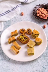 Mix pistachio baklava. Assortment of pistachio baklava on a stone background. Turkish cuisine desserts. close up