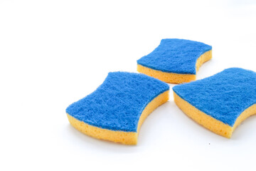 set of yellow and blue bathroom or kitchen sponges on white background