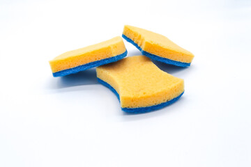 set of yellow and blue bathroom or kitchen sponges on white background