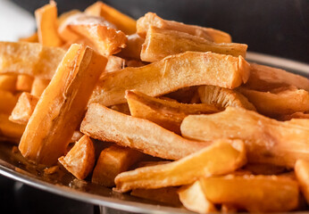 Serving fried aipin served in a typicalBrazilian restaurant