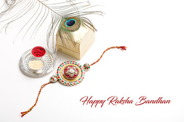 indian festival raksha bandhan: Rakhi or wrist band gift box on white background.