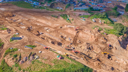 Aerial view of excavators on earthwork at construction site. Earthworks during the install of storm...