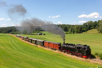 Fototapeta na wymiar Öchsle steam train locomotive railway near Ochsenhausen Wennedach in Germany