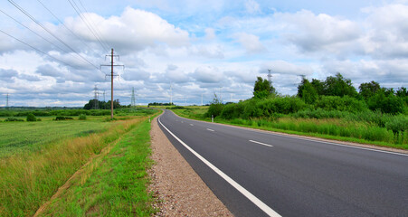 Fototapeta premium Highways, wind turbines and power lines.