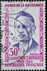 FRANCE - circa 1959: a postage stamp from FRANCE , showing a portrait of Gaston Moutardier (1889-1944). Hero of the French Resistance