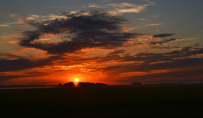 Fototapeta na wymiar Sunrise.Impressive cloud landscape. Idyllic rural landscape.