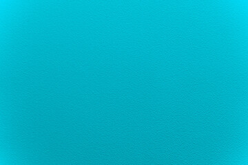 Blue wall with plaster background. Surface with texture and grain. Finishing, decor concept.