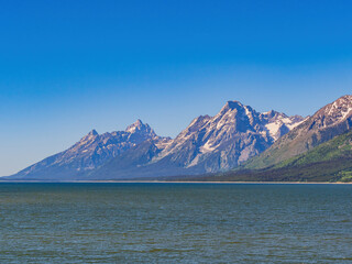 Sunny view of the Teton mountain range of Grand Teton National Park