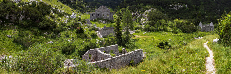 Fototapeta na wymiar Mali Lepoc Location of Ruins of Italian Fortness from time before the WWII near Lake Krn in Triglav National Park, Slovenia.
