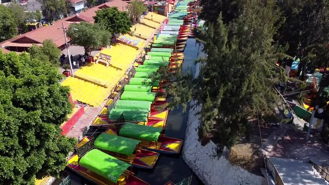 An aerial view of colourful Mexican boats for trips through the Xochimilco channels in Mexico city