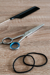 Scissors and comb for cutting hair at home