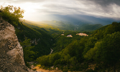 Fototapeta premium Summer green hills with sunset in Racha region , Georgia, Caucasus