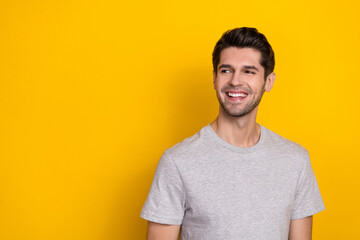 Photo of good brunet millennial guy look promo wear trend cloth isolated on yellow color background
