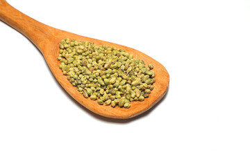 Heap of Dry thyme in wooden spoon isolated on white background. Dried spice concept