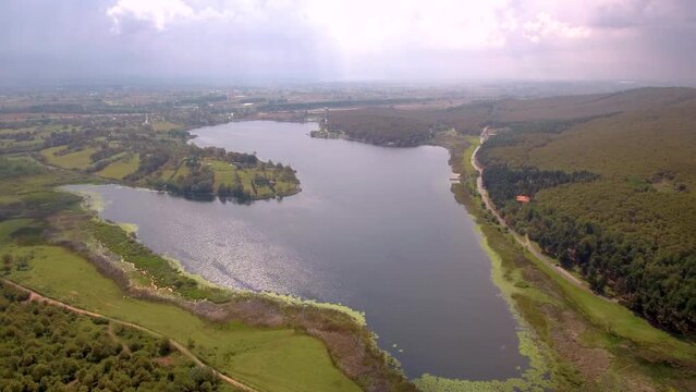 Poyrazlar Lake Nature Park Sakarya Turkey aerial footage green grass and reeds entire lake is visible