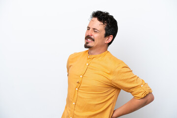 Fototapeta premium Young man with moustache isolated on white background suffering from backache for having made an effort