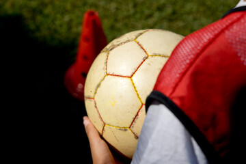 soccer ball stopped on the field ready to be kicked