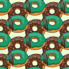 Seamless pattern with hand drawn green and chocolate brown donuts on light green background