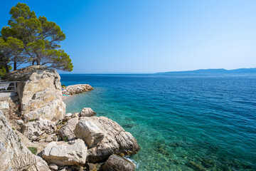 Fototapeta na wymiar view on amazing azure adriatic sea on dalmatian coast in Brela on Makarska riviera in Dalmatia in Croatia