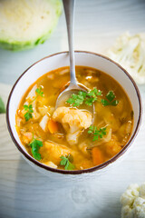vegetable summer soup with cauliflower in a bowl