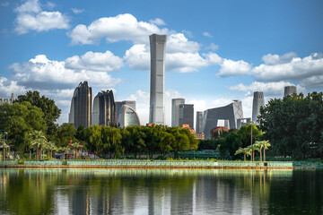 Obraz premium Reflection on the water surface of Beijing CBD buildings
